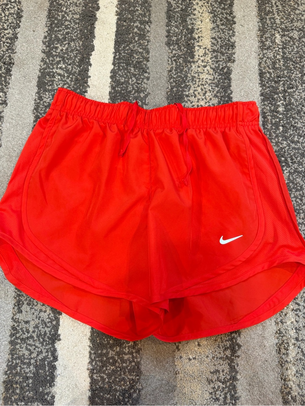 Nike Women’s Red Athletic Running Shorts with White Swoosh